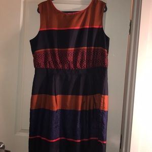 Navy, orange, and red dress